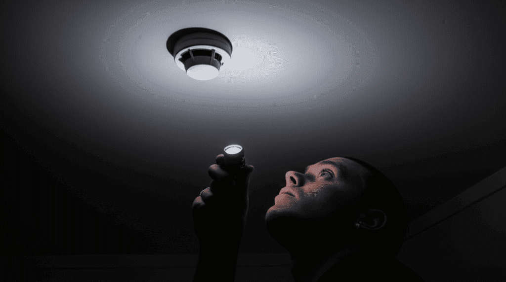 A hidden camera disguised as a smoke detector; how to detect hidden cameras.